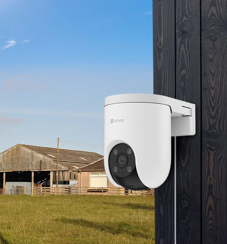 EZVIZ H8c 2K 4G camera mounted on outdoor wall