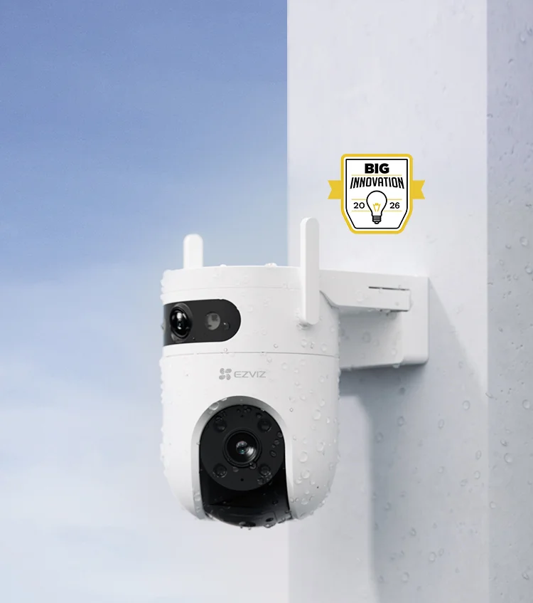 EZVIZ H9c Dual 2K camera mounted on outdoor wall in rain